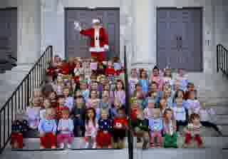 Preschool Christmas visit with Santa on the church steps